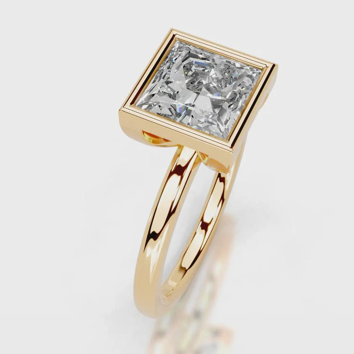 Direct front view of 4 CT princess cut lab grown diamond bezel solitaire ring in rose gold.
