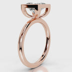Close-up view of open gallery basket detail on 4 CT princess lab diamond ring in white gold.