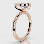 Side profile view of 4 CT pear cut lab diamond ring with open gallery in rose gold.