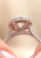 Macro close-up view highlighting the detailed hidden pavé bridge and under-gallery of a 3 carat oval halo ring.