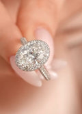Close-up top view displaying the facet pattern and brilliance of a 3 CT oval cut lab grown diamond center stone.