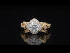 High-detail angled shot of 2 CT round brilliant center diamond and milgrain halo.