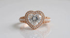 Direct front view of 4 CT heart cut lab diamond ring with pearl and filigree shank.