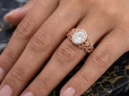 Full hand perspective wearing 3 CT oval lab grown diamond nature-inspired rose gold ring.