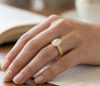 On-hand view of 4 CT oval lab grown diamond vintage engraved engagement ring.