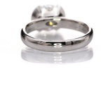 Rear view of the high-polished white gold band and under-gallery of the 2 CT round lab diamond ring.