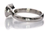 Detailed side angle of the half-bezel mount and sleek polished shank on the 2 CT round lab diamond ring.