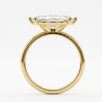 Side profile view of a 3 CT East-West marquise lab grown diamond ring in polished yellow gold.