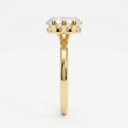 Side view showing the six-prong basket gallery holding a horizontal marquise diamond on a thin band.