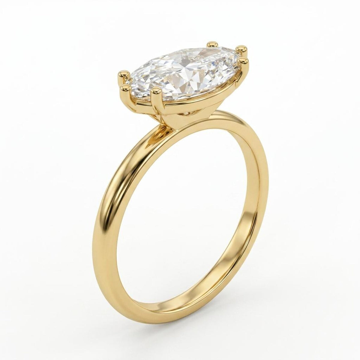 Angled perspective view of a 3 CT East-West marquise cut lab grown diamond solitaire ring in yellow gold.