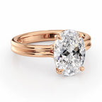 Angled perspective view highlighting the rose gold double-wire band on a 4 CT oval lab diamond ring.