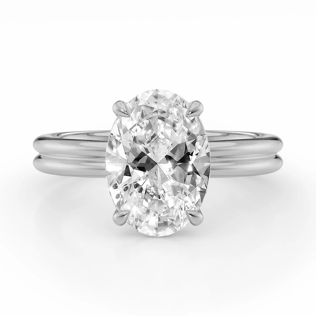 Front view of a 4 CT oval lab grown diamond ring in white gold featuring a dual-rail band.