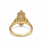 Undergallery profile view of a 4 CT marquise lab grown diamond ring displaying hidden accent diamonds and basket struts.
