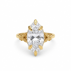 Top-down view of a 4 CT marquise cut lab grown diamond engagement ring with sculpted leaf prongs and floral shoulders.