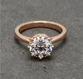 Face-up view showcasing the 6-prong setting and brilliant cut of a 2 CT round lab-grown diamond.