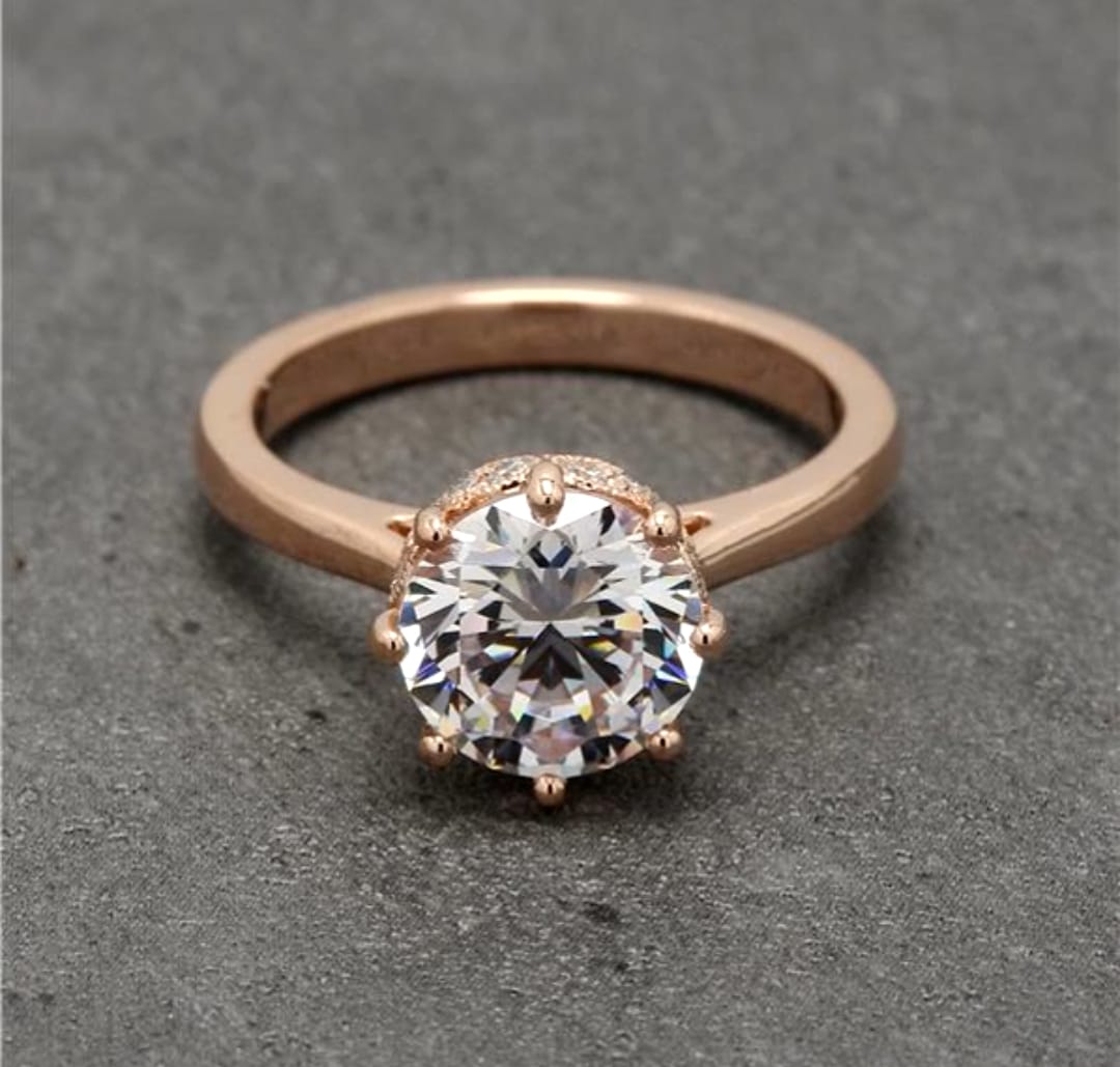 Face-up view showcasing the 6-prong setting and brilliant cut of a 2 CT round lab-grown diamond.