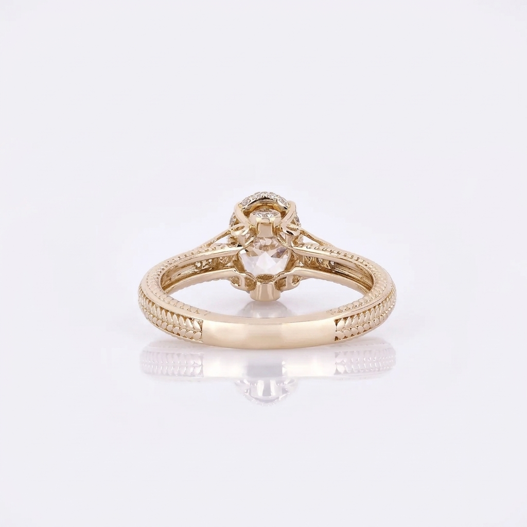 Interior and gallery view of a 3 CT oval lab grown diamond ring with hand-carved band pattern and hidden halo in 14K yellow gold.