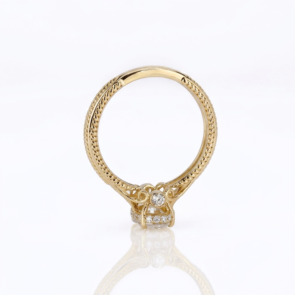 Side profile view of a yellow gold 3 CT oval lab diamond engagement ring showing filigree scrollwork and a bezel-set bridge accent diamond.