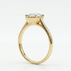 Perspective side view of a 3 CT oval cut lab grown diamond ring with a vintage scalloped setting and polished yellow gold band.