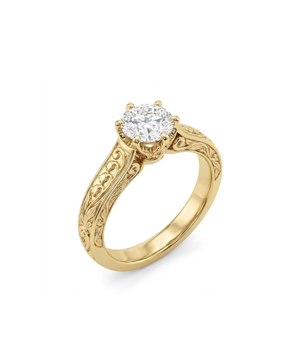 Perspective view of a 3 CT round cut lab diamond solitaire ring featuring relief scrollwork engraving on a 14K yellow gold band.