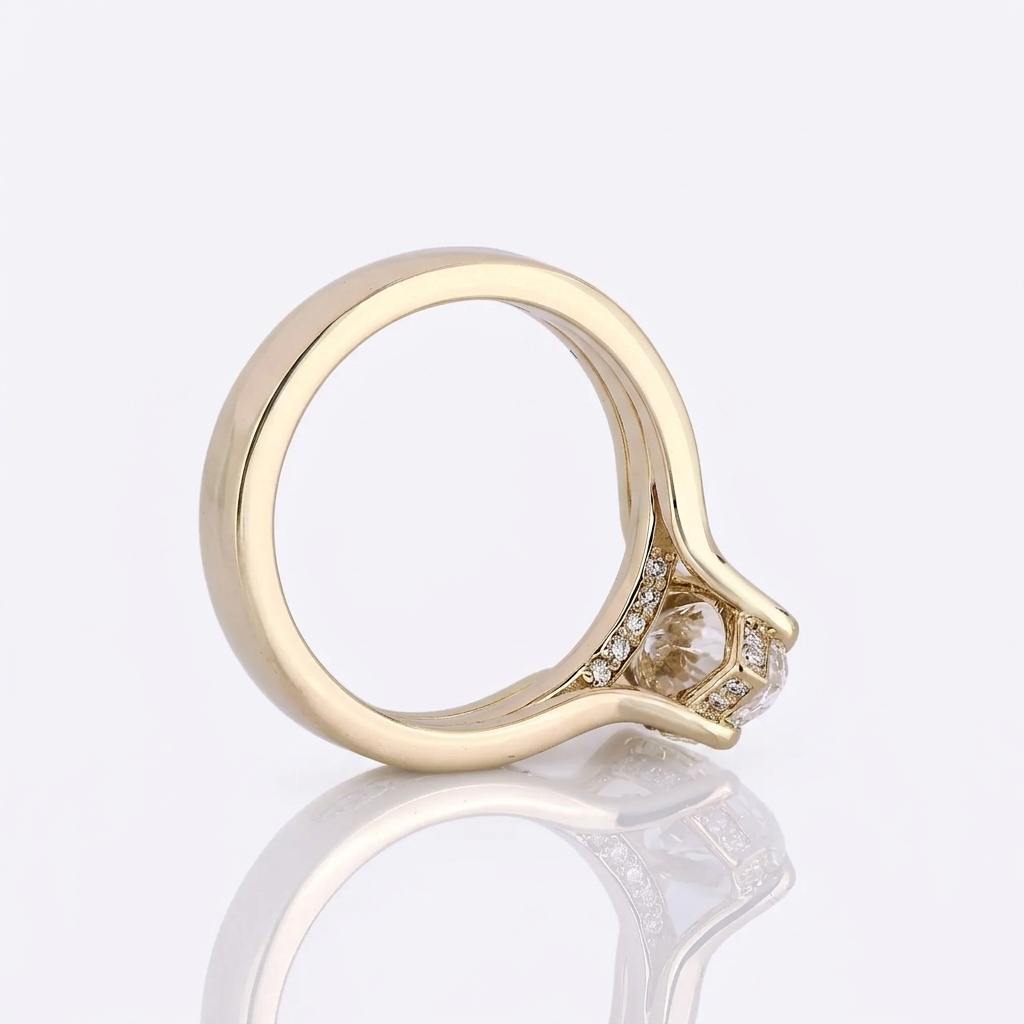 Side view highlighting the thick gold shank, cathedral setting, and pavé-accented bridge gallery.
