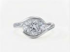 Top-down view of a 3 CT horizontally set oval lab grown diamond bypass ring in white gold with pavé shoulder accents.