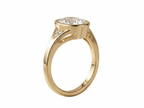 Side profile view of a yellow gold 3 CT oval lab grown diamond bezel engagement ring with pave accent shoulder.