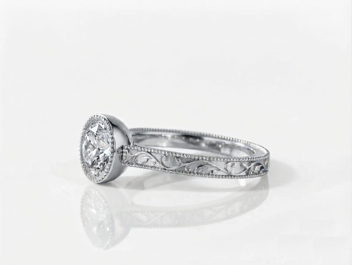Side view of a white gold 3 CT round lab grown diamond ring with milgrain bezel and engraved band.