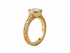 Profile view of a yellow gold vintage 3 CT round lab grown diamond bezel engagement ring with filigree details.