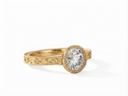Angled perspective of a yellow gold 3 CT round lab diamond ring showing filigree engraved band.