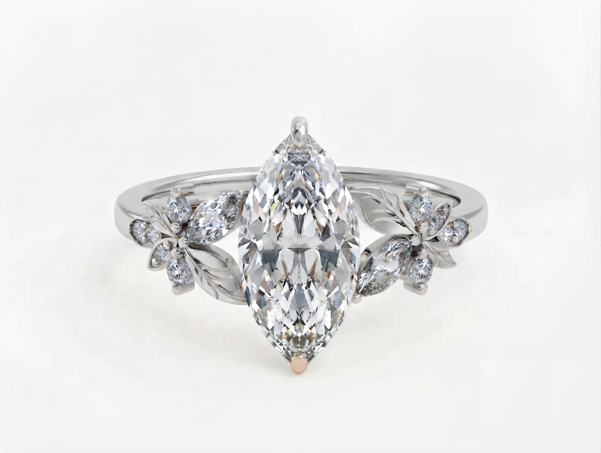 Top view of a white gold 3 CT marquise cut lab grown diamond engagement ring with floral leaf side clusters.