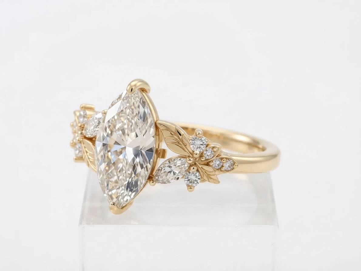 Angled profile view of a yellow gold 3 CT marquise cut lab grown diamond nature inspired ring.