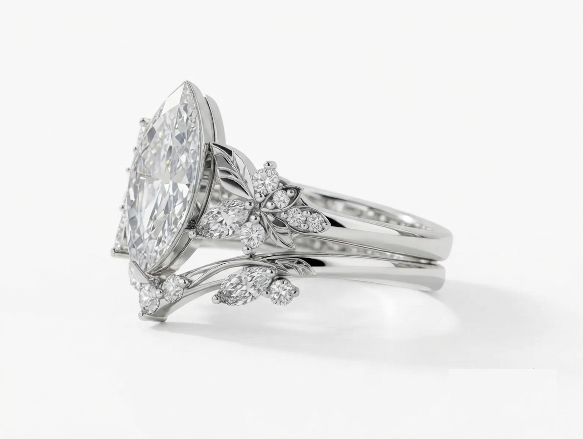 Side view of a white gold 3 CT marquise lab grown diamond engagement ring stacked with matching curved band.