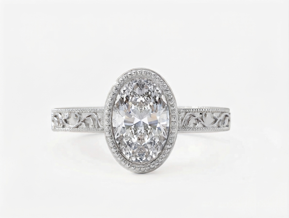 Top-down perspective of a white gold 3 CT oval cut lab grown diamond vintage milgrain engagement ring.