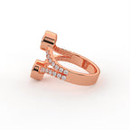 Side angle view of a rose gold two stone round lab grown diamond bezel ring with pavé split shank.