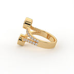 Perspective view of a two stone round lab grown diamond bezel ring in yellow gold with diamond split band.