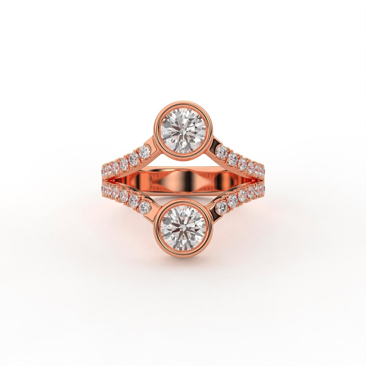 Top-down view of a rose gold Toi et Moi round lab grown diamond bezel ring with split pavé band.