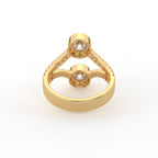 Interior view of a yellow gold two stone round lab grown diamond bezel ring showing band detail.