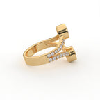 Side profile view of a yellow gold two stone round lab diamond ring with double split pavé band.