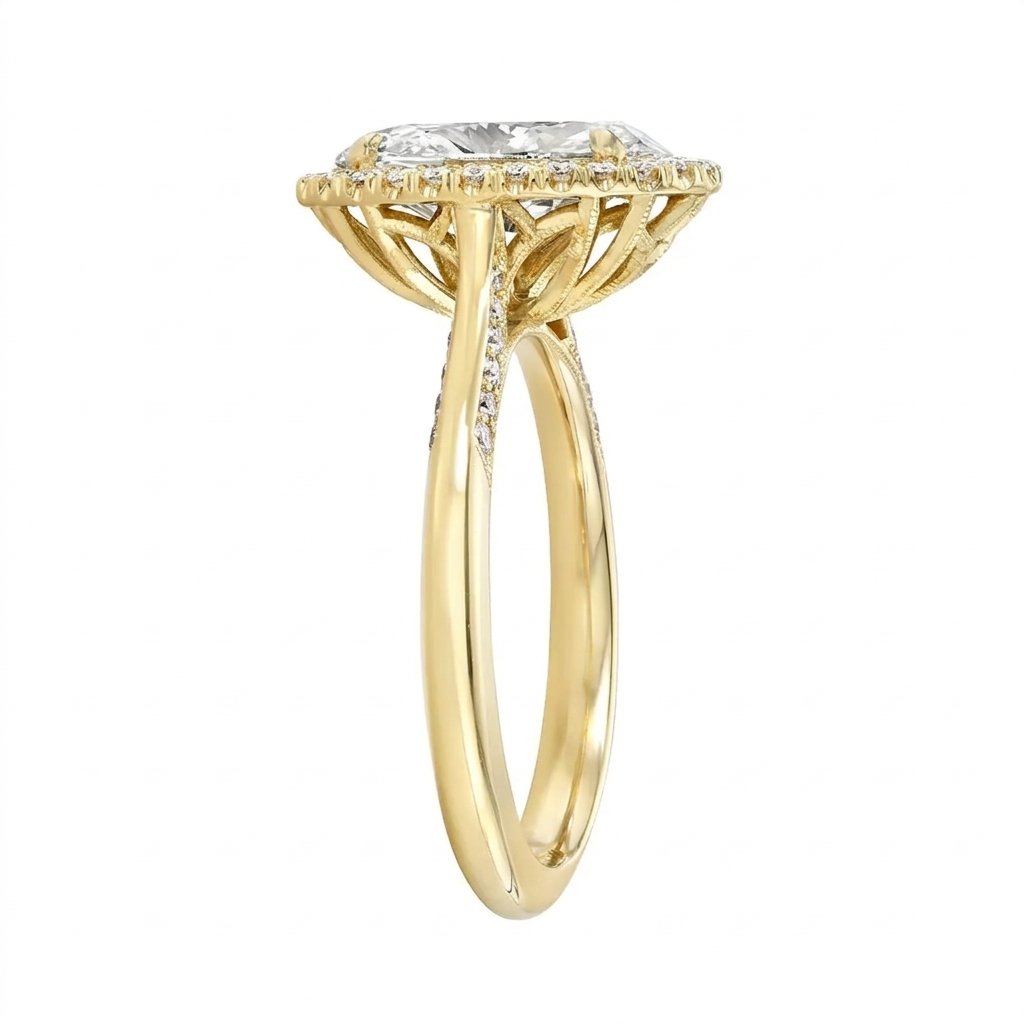 Side perspective view of a yellow gold 3 CT oval lab diamond halo ring with milgrain band and lotus basket.
