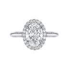 Top-down view of a white gold 3 CT oval cut lab grown diamond halo engagement ring.