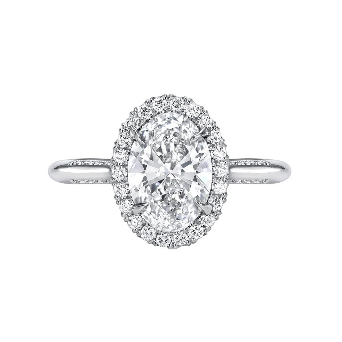 Top-down view of a white gold 3 CT oval cut lab grown diamond halo engagement ring.
