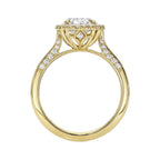 Straight profile shot of a rose gold 3 CT oval lab diamond halo engagement ring displaying lotus undergallery.