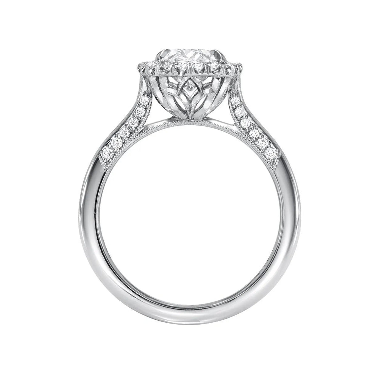 Side profile view of a white gold 3 CT oval lab grown diamond engagement ring with carved lotus basket.