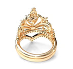 Top-down perspective showing the inner gold bands and stacked crown design of the pear diamond tiara ring set.
