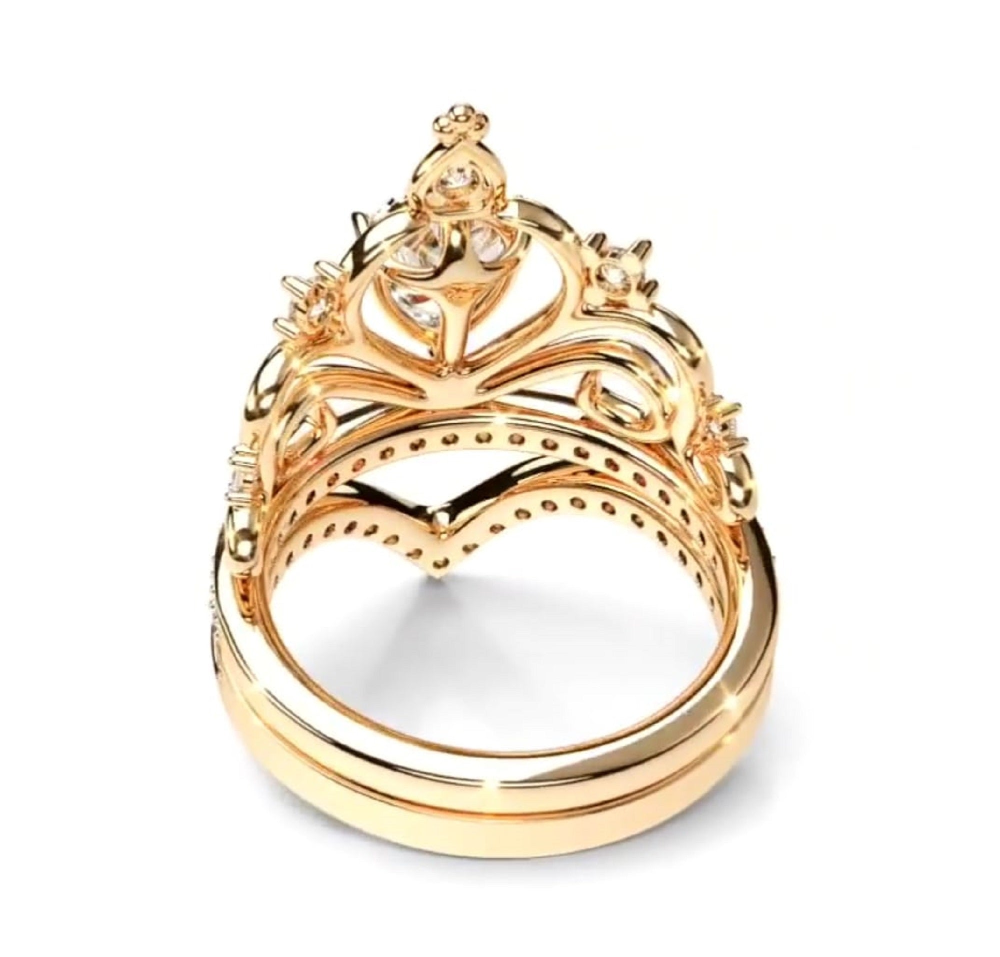 Top-down perspective showing the inner gold bands and stacked crown design of the pear diamond tiara ring set.