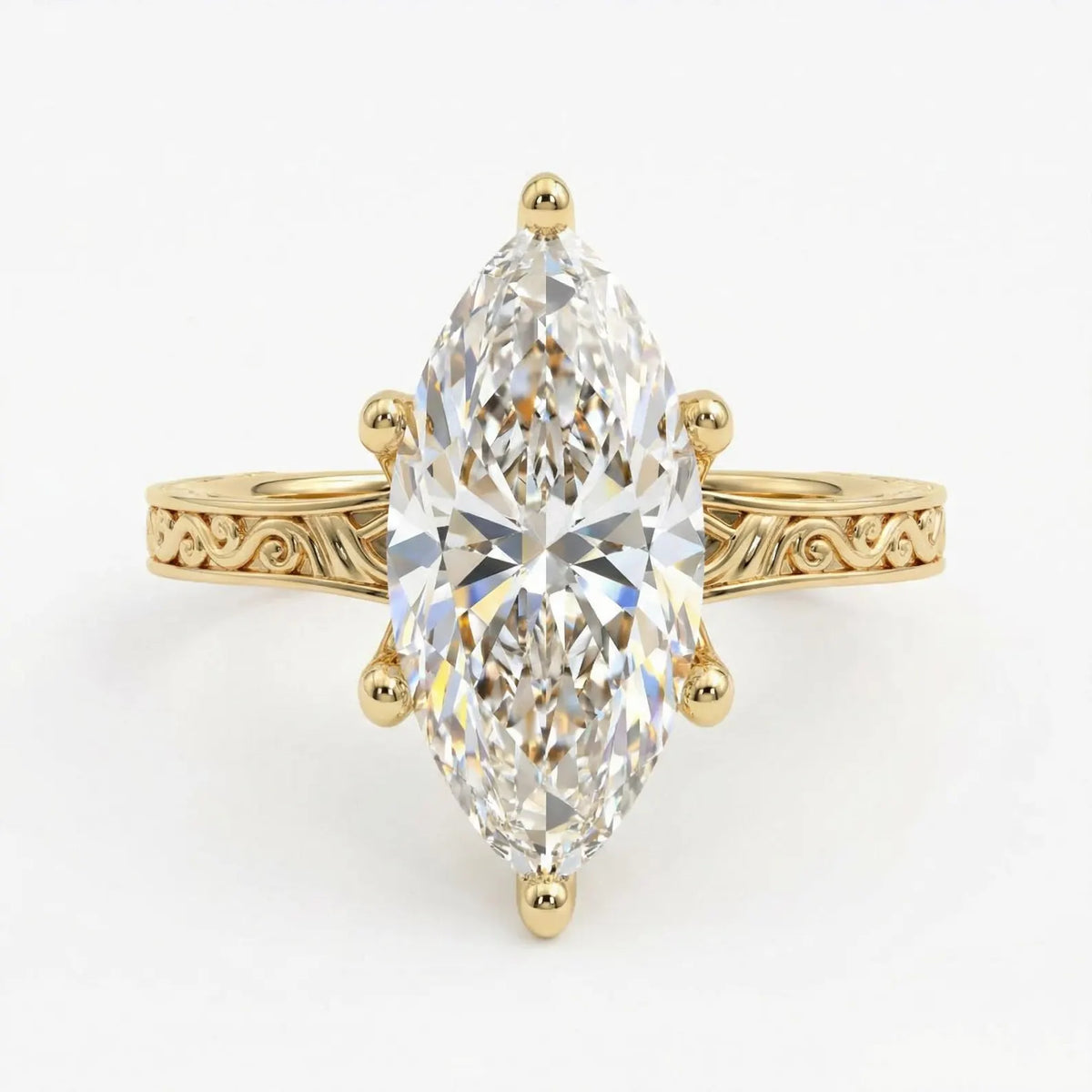 Top-down view of a 4 CT marquise cut lab grown diamond solitaire engagement ring with 6 prongs and engraved yellow gold band.