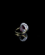 under-gallery-view-of-red-oval-moissanite-halo-engagement-ring
