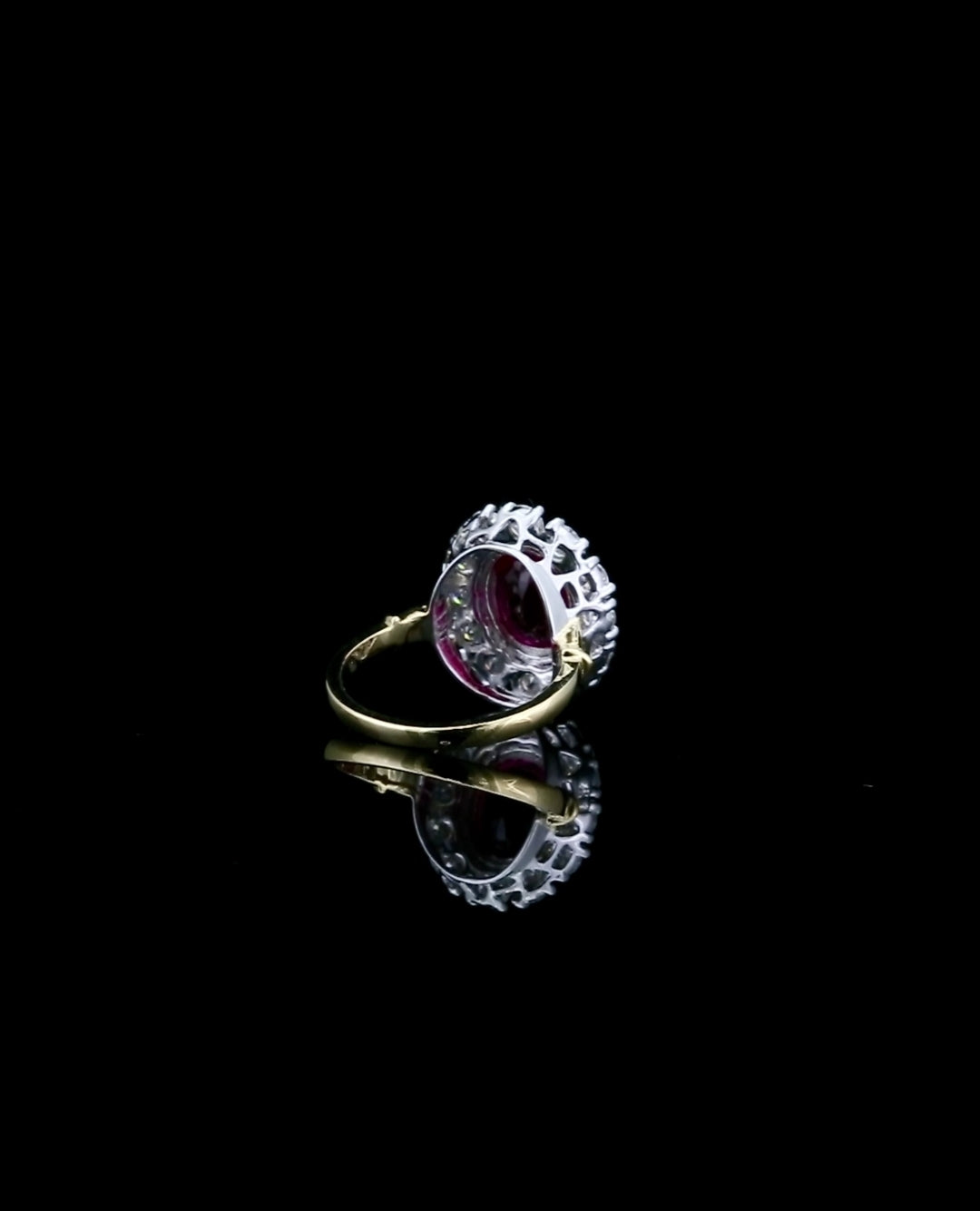 under-gallery-view-of-red-oval-moissanite-halo-engagement-ring