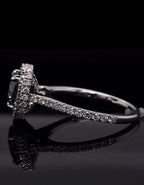 Detailed view of the sparkling diamond pave band on the grey moissanite ring.